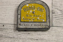 Load image into Gallery viewer, Vintage Handi-gal Six Foot Slim n&#39; Trim Metal Tape Measure - Used