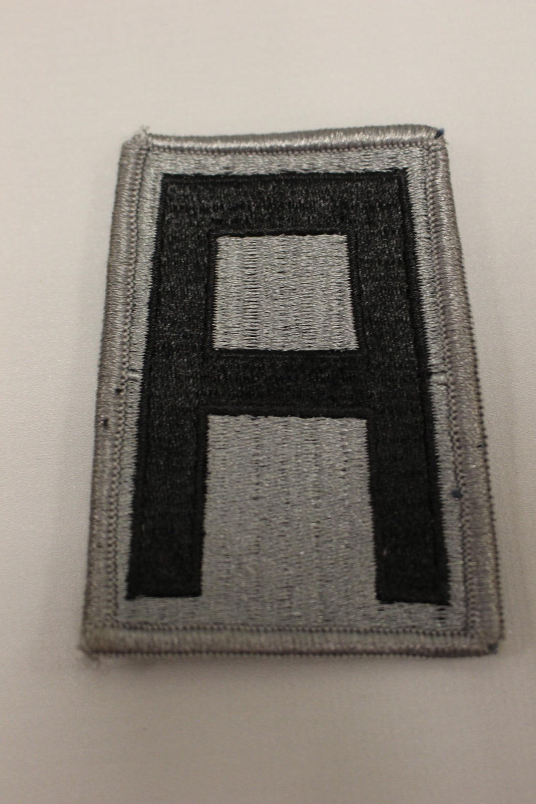 1st Army OCP Patch with Hook Fastener - Gray - Used